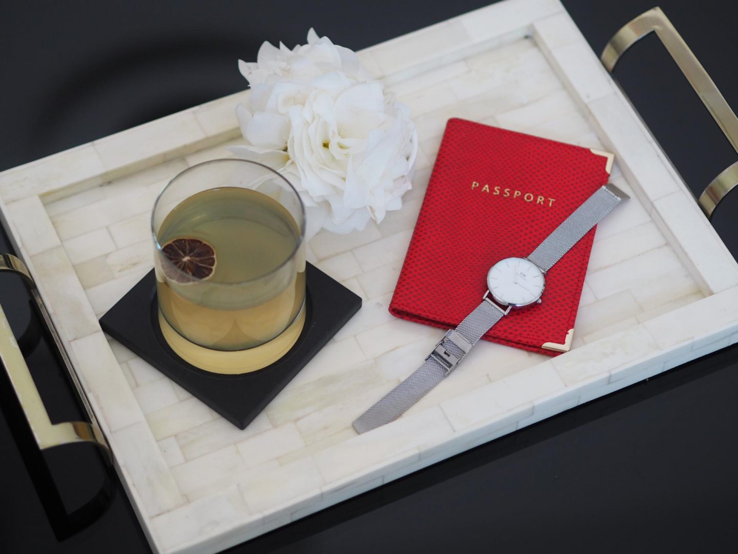 Luxury Caribbean Travel - Passport and watch