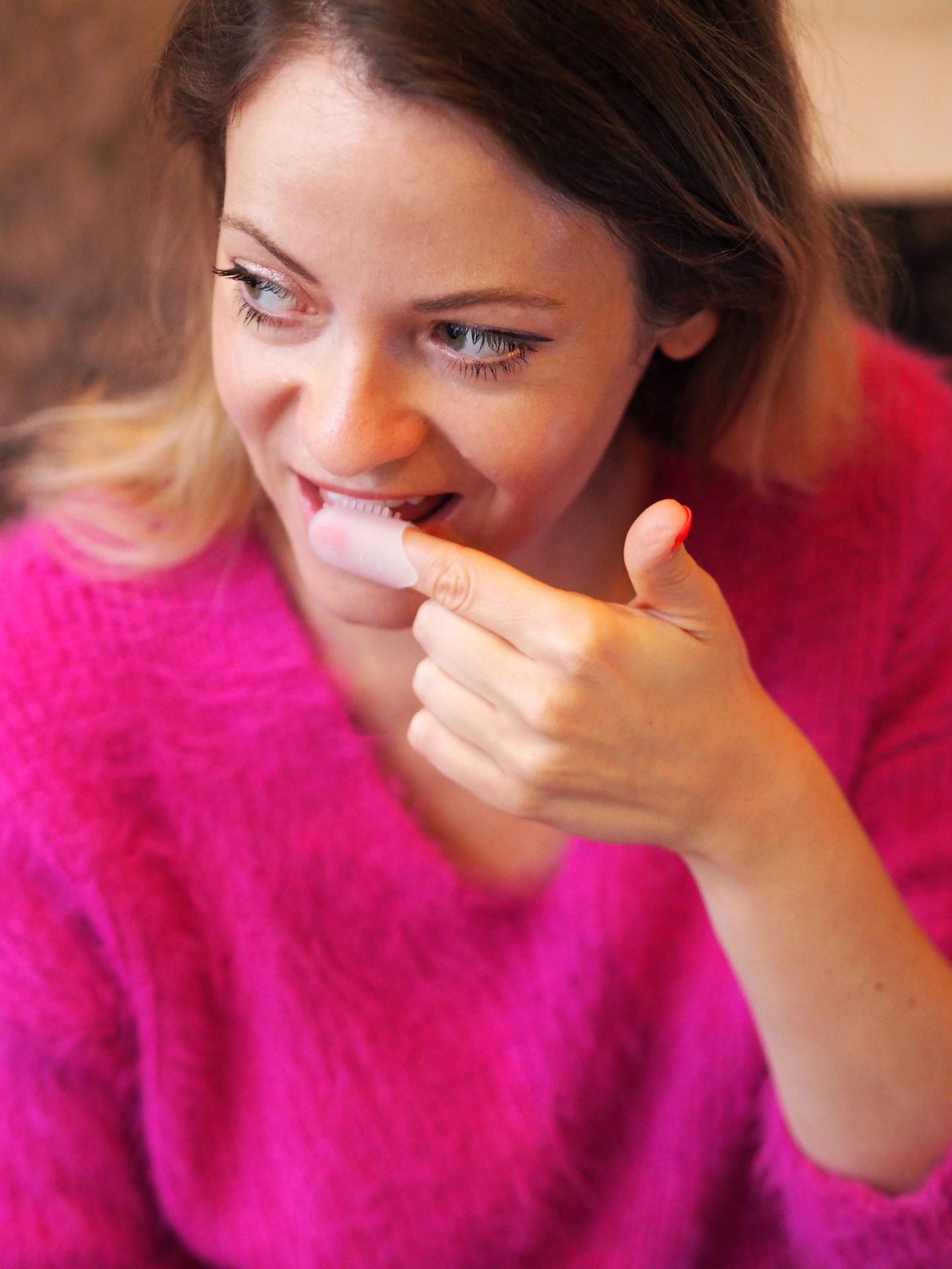 cleaning teeth on the go - iko Finger Toothbrush from Melo Labs