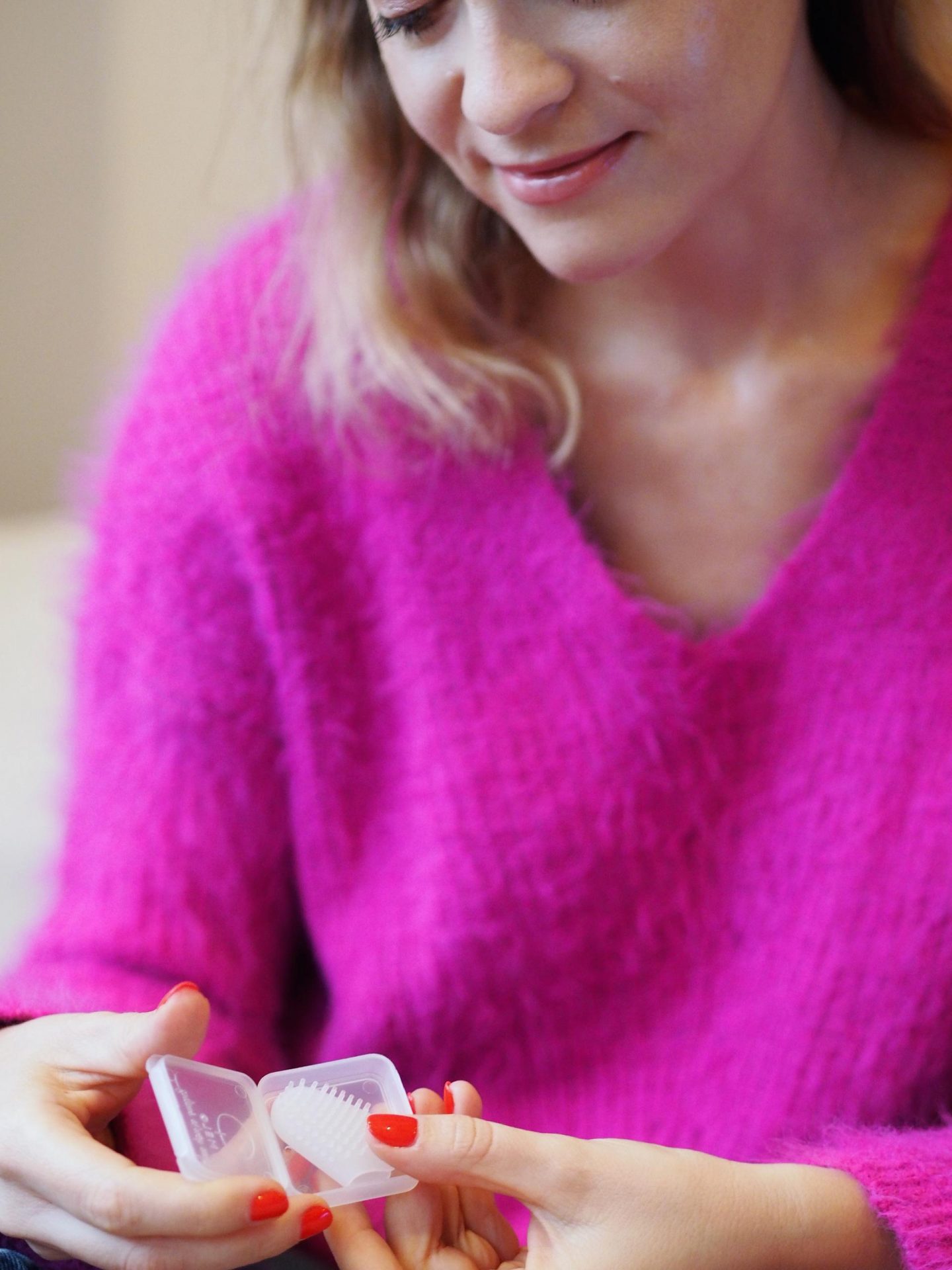 cleaning teeth on the go - iko Finger Toothbrush from Melo Labs